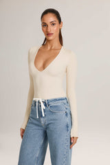 Elodie-Modal Plunge Long-Sleeve Bodysuit in Ivory